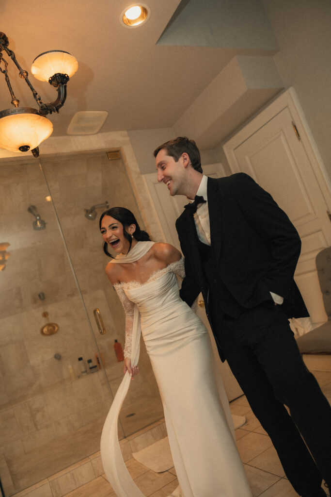 Bride and groom laughing together after private wedding ceremony